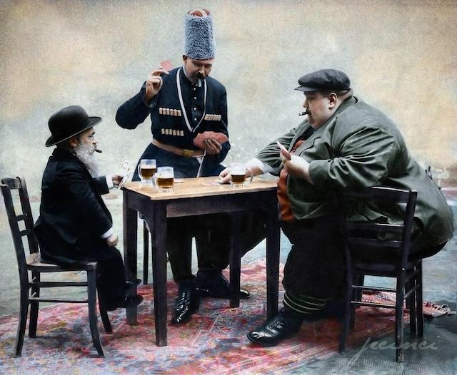 The shortest, tallest and fattest man of Europe playing a game of cards, 1913.